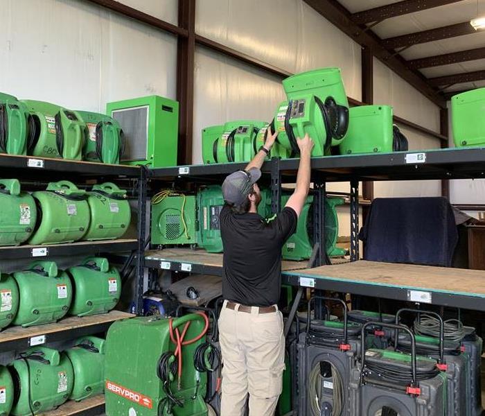 Team Member getting equipment ready in warehouse